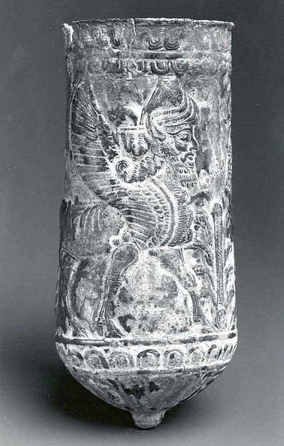 Beaker with winged human-headed bulls flanking a stylized tree 5.5 in. (13.97 cm)